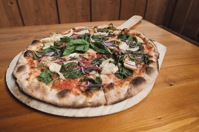 Mad Dog pizza with hot peppers and spicy sauce